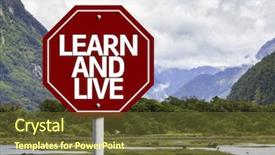  Presentation with learn - Amazing PPT theme having written on red road sign backdrop and a tawny brown colored foreground