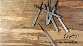  Presentation with dark vintage wood table texture - PPT layouts featuring lock picks on wooden table background and a  colored foreground