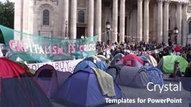  Presentation with cities - Theme having london-oct-23-anti-capitalist background and a ocean colored foreground