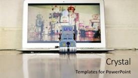  Presentation with robot toy - PPT theme consisting of lone blue robot toy watching a laptop computer background and a mint green colored foreground