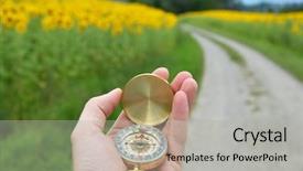  Presentation with compass road - Audience pleasing PPT theme consisting of longitude - compass in the hand backdrop and a light gray colored foreground