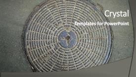  Presentation with sewer - Audience pleasing PPT theme consisting of sewer cover in the street backdrop and a gray colored foreground