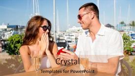  Presentation with dating - Presentation enhanced with love dating people and holidays concept - smiling couple wearing sunglasses with champagne and small red gift box looking to each other at cafe background and a coral colored foreground