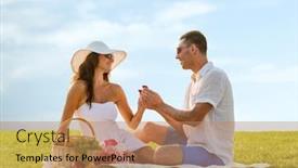  Presentation with blue proposal - Audience pleasing theme consisting of love dating people proposal and holidays concept - smiling young man giving small red gift box with wedding ring to his girlfriend on picnic over blue sky and grass background backdrop and a coral colored foreground