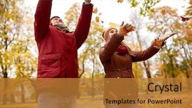  Presentation with relationships - Cool new presentation theme with love relationships season and people concept - happy young couple throwing autumn leaves up in park backdrop and a gold colored foreground