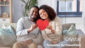  Presentation with relationships - PPT theme with love valentines day and relationships concept - happy african american couple holding red heart together at home background and a coral colored foreground
