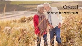  Presentation with sand dunes - Beautiful theme featuring loving-active-senior-couple-walking backdrop and a coral colored foreground
