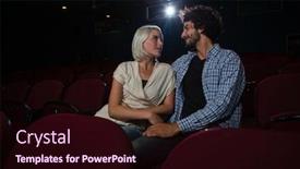  Presentation with theatre - Audience pleasing PPT theme consisting of loving couple looking at each other while sitting in the theatre backdrop and a wine colored foreground