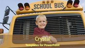  Presentation with school bus - Amazing slides having low angle view of cute boy standing arms crossed in front of school bus backdrop and a tawny brown colored foreground