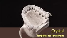  Presentation with black dental - PPT layouts having lower-human-jaw-with-teeth background and a tawny brown colored foreground
