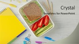  Presentation with healthy lunchbox - Presentation theme having lunchbox with dinner and stationery background and a light gray colored foreground