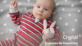  Presentation with baby toy - Presentation design having lying in cradle at home background and a gray colored foreground