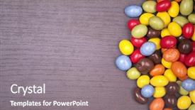  Presentation with evolution of chocolates - Cool new presentation design with m - colorful chocolates on wooden background backdrop and a gray colored foreground