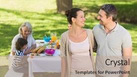  Presentation with extended family - Colorful PPT theme enhanced with m dia - couple with extended family dining backdrop and a coral colored foreground