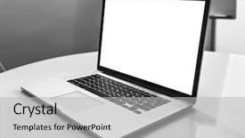  Presentation with black - Amazing PPT theme having mac - new laptop on table backdrop and a light gray colored foreground