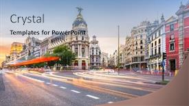 Presentation with spain - Colorful theme enhanced with madrid spain cityscape at calle de alcala and gran via backdrop and a light blue colored foreground