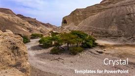  Presentation with dirt - Amazing PPT layouts having magnificent-stone-canyon backdrop and a coral colored foreground