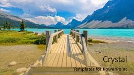  Presentation with canada - Audience pleasing theme consisting of majestic mountain lake and small wooden bridge in canada backdrop and a gold colored foreground