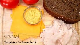  Presentation with cheddar - Presentation theme featuring makings of a turkey sandwich includeing dark german wheat sliced turkey tomatoe spicey mustard cheddar cheese background and a yellow colored foreground