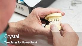  Presentation with dental implants - PPT theme enhanced with male dental technician working background and a tawny brown colored foreground