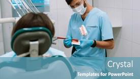  Presentation with dentures - Presentation design featuring male-dentist-shows-dentures background and a teal colored foreground