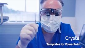  Presentation with dental - Amazing presentation theme having male dentist with dental loupes backdrop and a  colored foreground