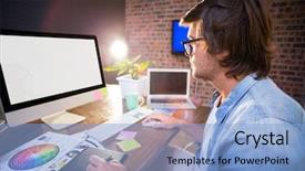  Presentation with graphic - Presentation with male graphic designer using computer in creative office background and a light blue colored foreground