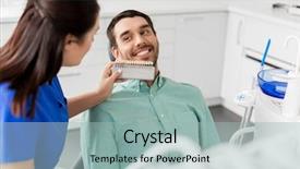  Presentation with medicine - Slide set having male patient teeth at dental background and a light blue colored foreground