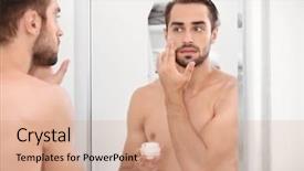  Presentation with face scrub cream - Beautiful PPT theme featuring male skin care - young handsome man applying cream backdrop and a coral colored foreground