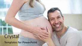  Presentation with stomach - Cool new slide set with man listening to pregnant womans stomach in bedroom backdrop and a coral colored foreground