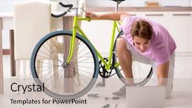  Presentation with bicycle generator - Presentation theme featuring man repairing his broken bicycle background and a soft green colored foreground