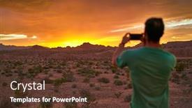  Presentation with nevada desert - Beautiful presentation featuring man taking photo with smartphone of very colorful sunset in nevada desert backdrop and a tawny brown colored foreground