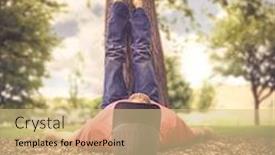  Presentation with filter - Presentation theme with man with his feet resting on a tree trunk during summer toned with a vintage retro instagram filter effect app or action background and a soft green colored foreground