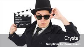  Presentation with clapper - Presentation theme featuring autumn scenic landscape with golden trees orange bushes yellow grass and blue sky with clouds background and a tawny brown colored foreground.