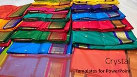  Presentation with woven - Presentation enhanced with many-colorful-indian-saaris-displayed background and a red colored foreground