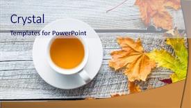  Presentation with tea leaves - Audience pleasing PPT theme consisting of maple drinks - cup of tea with autumn backdrop and a sky blue colored foreground