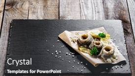  Presentation with black paper - Beautiful theme featuring marinated herring fillets on piece of paper on black stone backdrop and a dark gray colored foreground