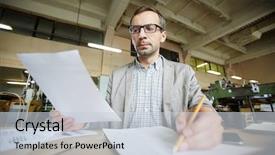  Presentation with paper making - Cool new PPT layouts with master data - serious man with paper making backdrop and a  colored foreground