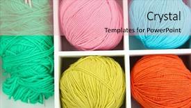  Presentation with knitting - Presentation theme consisting of material for knitting in white wooden box closeup background and a coral colored foreground