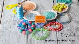  Presentation with manufacture - Cool new PPT theme with materials for manufacture of jewelry on table close-up backdrop and a light gray colored foreground