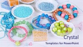  Presentation with manufacture - Presentation design having materials for manufacture of jewelry on table close-up background and a sky blue colored foreground