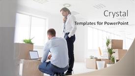  Presentation with new office - Cool new theme with mature businessman standing by young colleague using laptop on cardboard box at new office backdrop and a white colored foreground