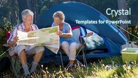  Presentation with camp - Amazing PPT theme having mature couple looking map backdrop and a ocean colored foreground