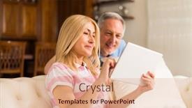 Presentation with using digital tablet - PPT layouts enhanced with mature-couple-using-a-digital background and a  colored foreground
