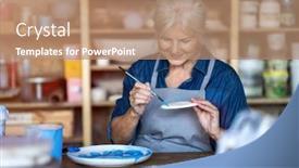  Presentation with clay - Audience pleasing slide set consisting of mature-craftswoman-painting-a-plate backdrop and a coral colored foreground