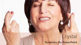  Presentation with fingers - PPT theme having mature woman with crossed fingers female showing a gesture with hands luck wish background and a coral colored foreground