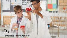  Presentation with chemical experiment - PPT theme having measure physics - attentive schoolboys doing a chemical background and a  colored foreground