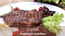  Presentation with meat food - Theme featuring meat food roast steak boneless with roast onion and red hot peppers served on green lettuce salad on dish isolated over wooden table background and a tawny brown colored foreground