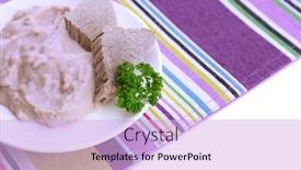  Presentation with infant - Colorful presentation design enhanced with meat paste for infant feeding on plate on color napkin isolated on white backdrop and a lavender colored foreground