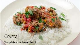  Presentation with cumin - Cool new presentation theme with meatballs smyrna cooked with a sauce of cumin red and yellow capsicums and tomatoes making a colourful and tasty dish backdrop and a soft green colored foreground